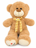 Fluffy warm honey bear with yellow floral daisy ribbon